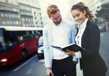 Real estate agent showing investment